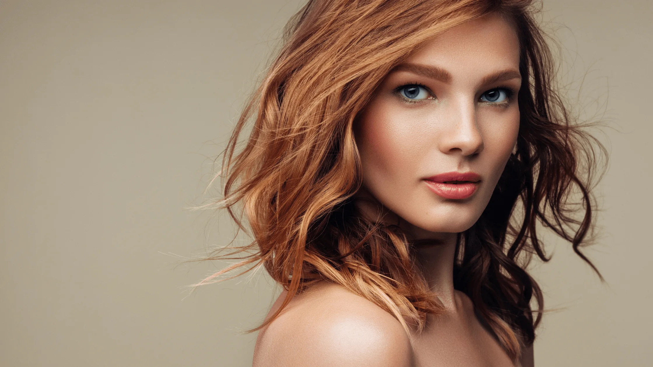 Woman with red hair representing hair-loss consultation and care